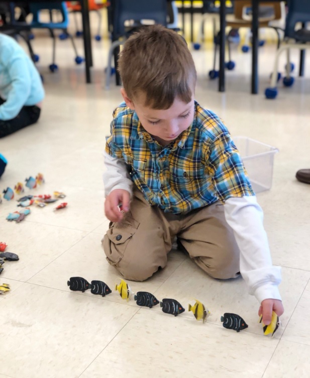 A Kindergarten student playing and learning at St. Andrew's Elementary in St. John's (photo credit: @kinderkuzins on Twitter)