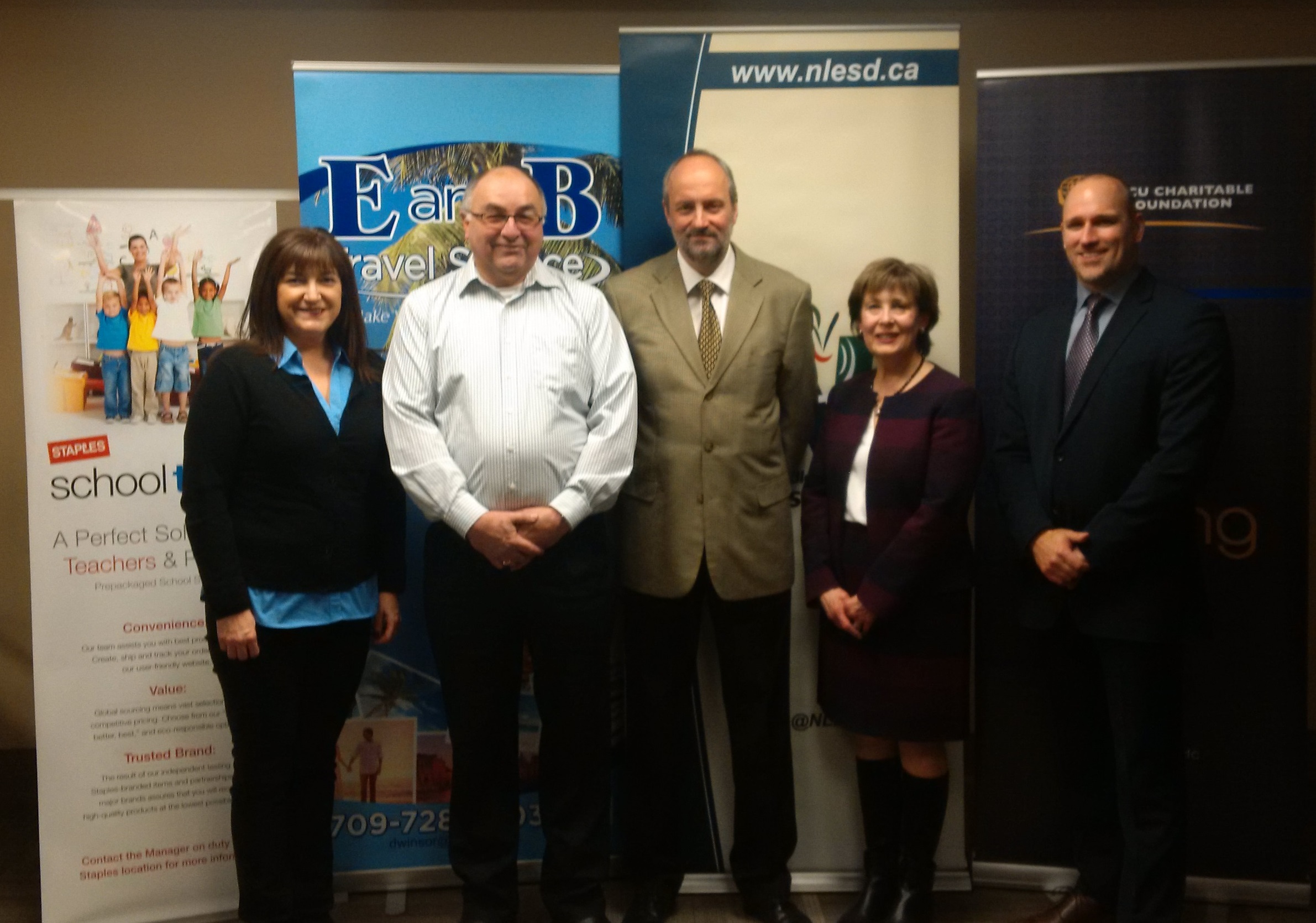 (L-R) Staples General Manager Janet Rumsey, TPI-E & B Travel's Derek Winsor, NLESD Director Darrin Pike, NLCU CEO Allison Chaytor Loveys, NLCU's Shannon Goodyear