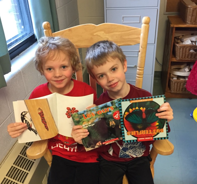Students in Mme. Morris' Kindergarten class at Beachy Cove Elementary enjoy reading (Photo credit: Twitter @BCEMorrisEFI)